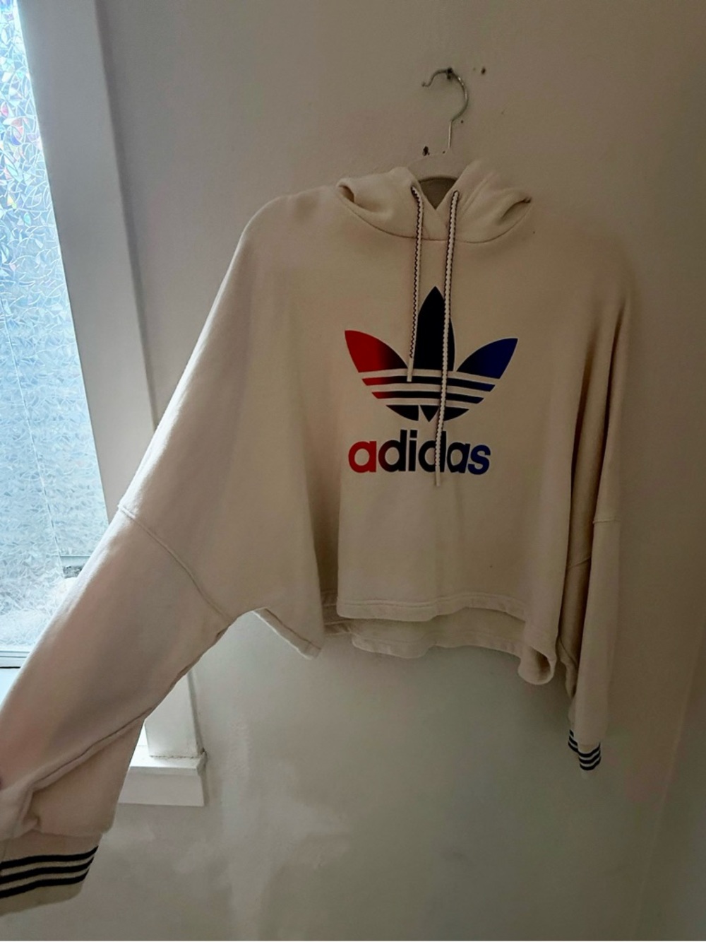 Adidas Trefoil Women’s Cropped Hoodie in Cream with Red & Blue Logo